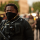 An armed demonstrator stands guard during a vigil in honor of Jayland Walker on July 8, 2022 in Akron, Ohio. Walker was shot and killed by members of the Akron Police Department on July 3, 2022.